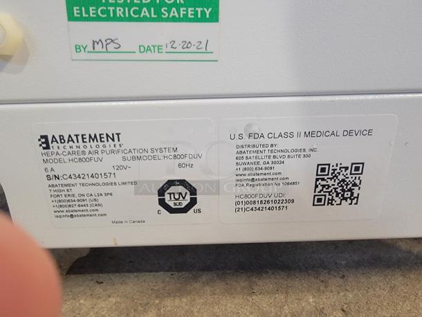 Abatement Technologies HC800FUV air purifier label, showing FDA Class II medical device designation and contact info.