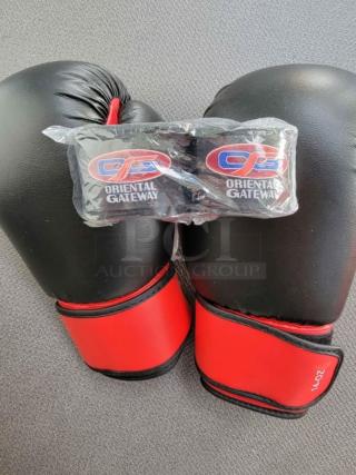 OG Martial Arts 14oz red/black boxing gloves with Velcro straps and sealed hand wraps, ideal for martial arts.