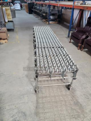 Nestaflex 275 gravity roller conveyor, heavy-duty steel, expandable, small rollers, locking casters, adjustable legs. Ideal for warehouses.