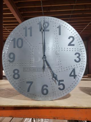 Howard Miller Aviator 625-629 wall clock, 33" industrial style, rivet-look face, set to 5:00 p.m., decor only.