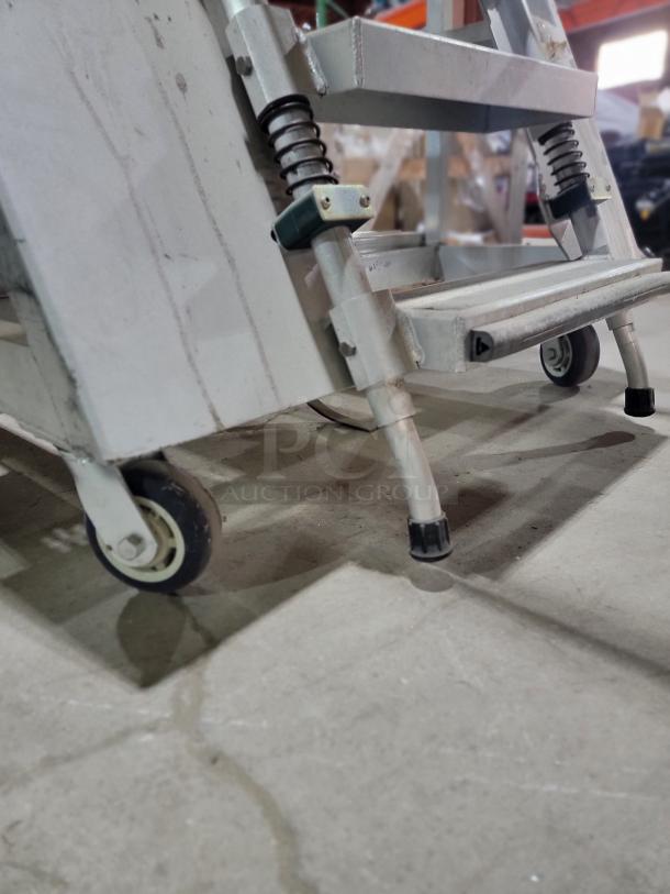 Heavy-duty 3-step New Age Industrial warehouse ladder cart, rust-resistant aluminum, safety design, USA-made.