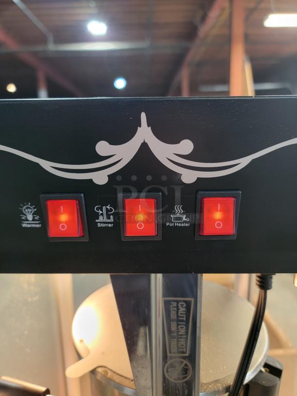 Great Northern Popcorn Popper Model 83-DT5629 with three-switch control for warmer, stirrer, and pot heater, tested working.