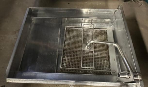 Pitco SSHBN55 high-efficiency 4-bank fryer battery with built-in filtration system, ideal for commercial kitchens.