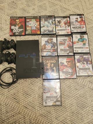 Sony PlayStation 2 console bundle with 12 games, two controllers. Classic PS2 Fat Model, great condition, includes popular titles.