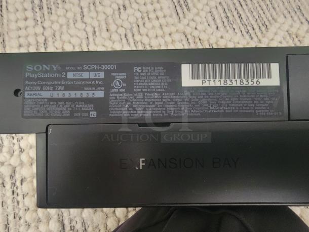 Sony PlayStation 2 Fat Model SCPH-30001 label with serial number U1831835, showing specifications and expansion bay.