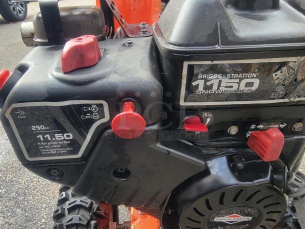 Ariens Deluxe 24" Snow Blower, Model 921011, featuring Briggs & Stratton 1150 engine, 250cc, 11.50 ft-lbs torque, excellent condition.