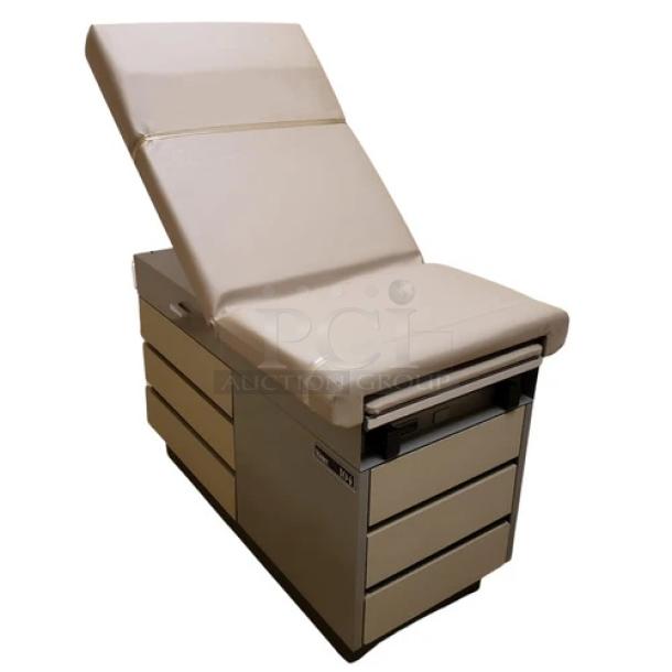 Riter/Brewer 104/Access heavy-duty power examination table, beige, adjustable back, multiple drawers, sturdy design, versatile use.