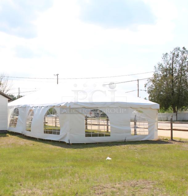 20'x40' Tent and Table BT-FW24WT3P premium frame tent with aluminum frame and white vinyl top. Includes blockout sidewall kit.