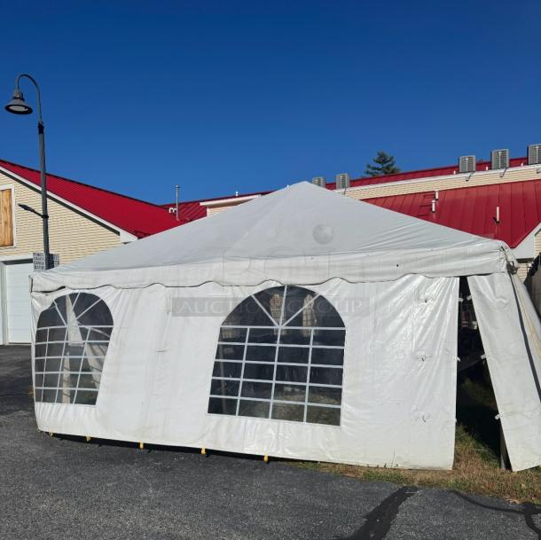 20'x40' Tent and Table BT-FW24WT3P frame tent with white vinyl top, blockout sidewalls, no center poles, excellent condition.