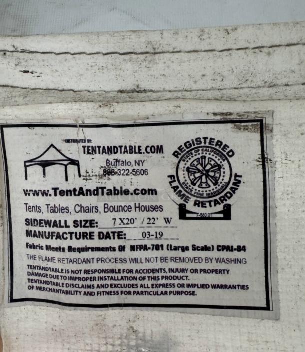 Tent and Table label showing sidewall size 7'x20', manufacture date 03-19, and flame retardant certification.