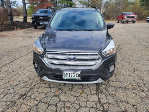 2018 Ford Escape SE 4WD in black, former security fleet vehicle with 61,936 miles. Needs new battery and timing belt check.