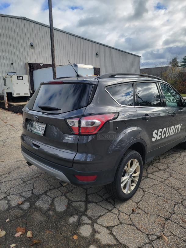 2018 Ford Escape SE 4WD, gray, rear view, "SECURITY" marking, former fleet vehicle, well-maintained, 61,936 miles.