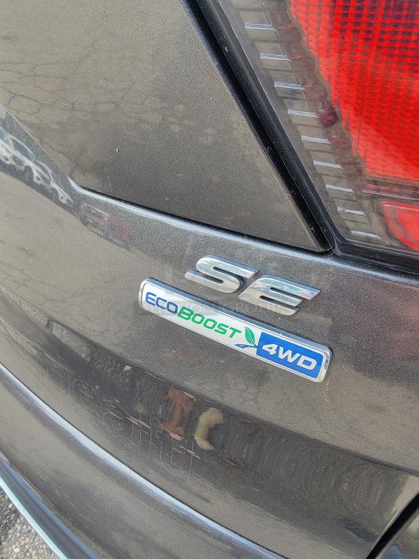 2018 Ford Escape SE 4WD rear view showing EcoBoost and 4WD badges on tailgate.