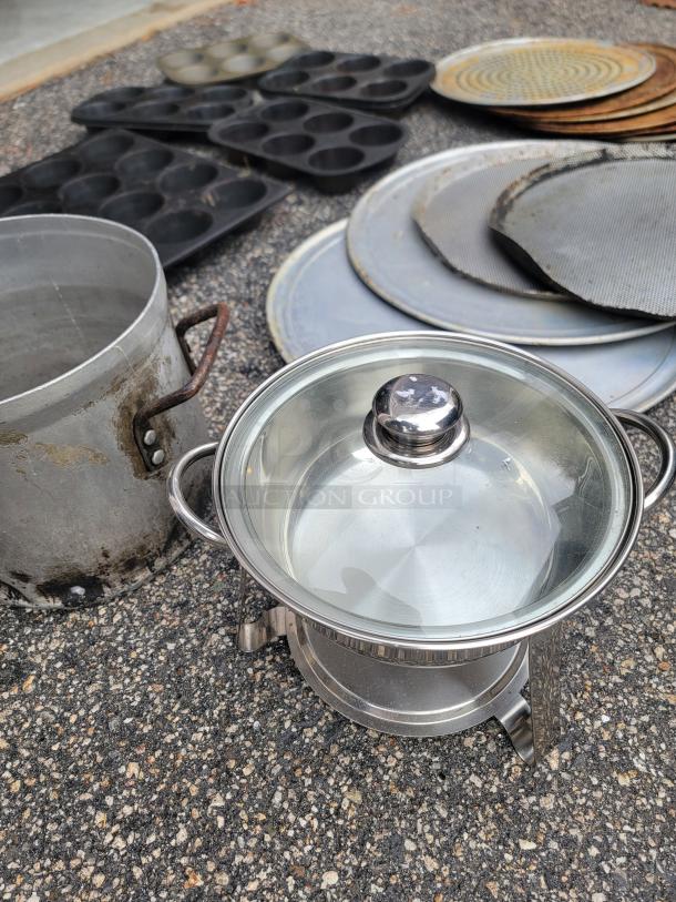 Huge lot of used baking pans, pizza screens, pots, and an 8-inch chafing dish with glass lid on a stand, various conditions.
