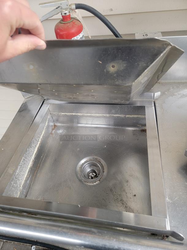 Heavy-duty 8' stainless steel workstation with sink, commercial-grade, durable, raised backsplash, ideal for food prep.