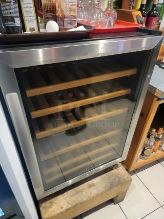 🍷 Eurodib Dual-Zone Wine Cooler 45 Bottles- Perfect for Enthusiasts! ✨ This sleek, Eurodib USF-54D Wine Cooler is the perfect addition for any wine lover's home or business. It features dual-zone cooling with separate temperature controls for the upper and lower chambers, allowing you to store reds and whites at their optimal serving or aging temperatures. The unit boasts an attractive stainless steel trim, a glass door, and natural wood sliding shelves to securely cradle your collection. It's designed for built-in or free-standing installation and uses the eco-friendly R600a refrigerant. Keep your favorite bottles perfectly chilled and ready to enjoy! - Item #1218747