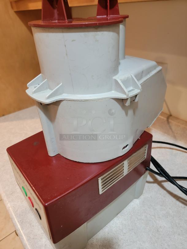 Robot Coupe R2NCLR food processor, used condition, 3-quart capacity, includes feed head, S-blade, slicing/grating disc.