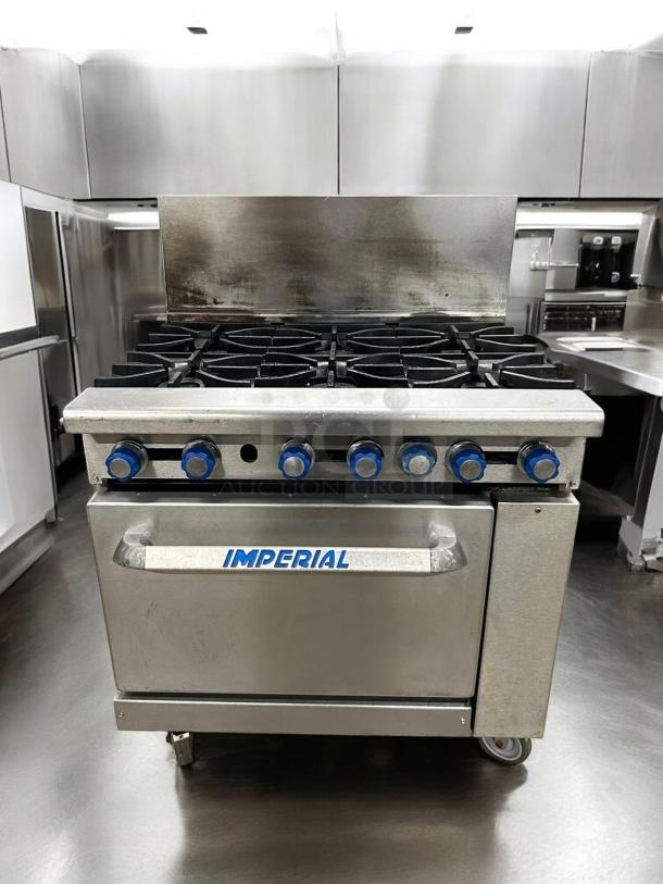 Imperial IR-6 gas range, 6 burners, with oven. Outstanding condition, natural gas, fully tested, Imperial label visible.