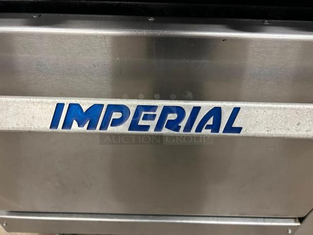 Imperial 6-burner gas range, model IR-6, in outstanding condition; features stainless steel build and "Imperial" label.