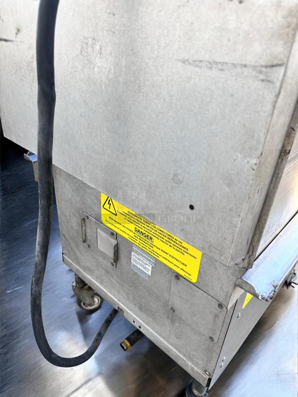 Garland XPG24-Q916 Double Platen Electric Grill, superb condition, 240V 3 Phase, with warning labels and attached power cord.