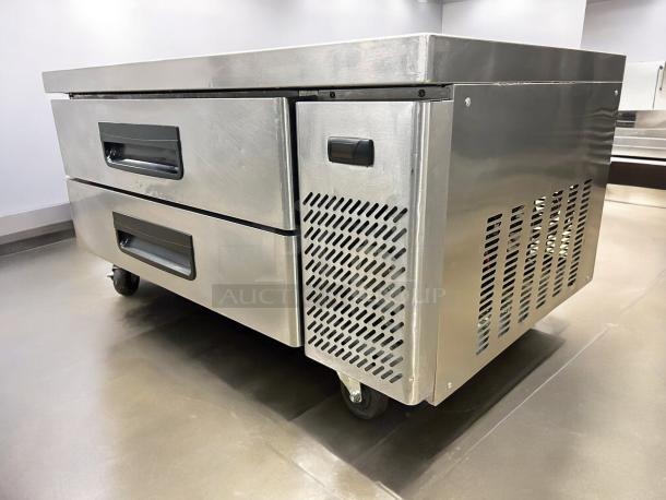 Blue Air BACB48M refrigerated chef base in pristine condition, features two drawers, stainless steel body, and caster wheels.