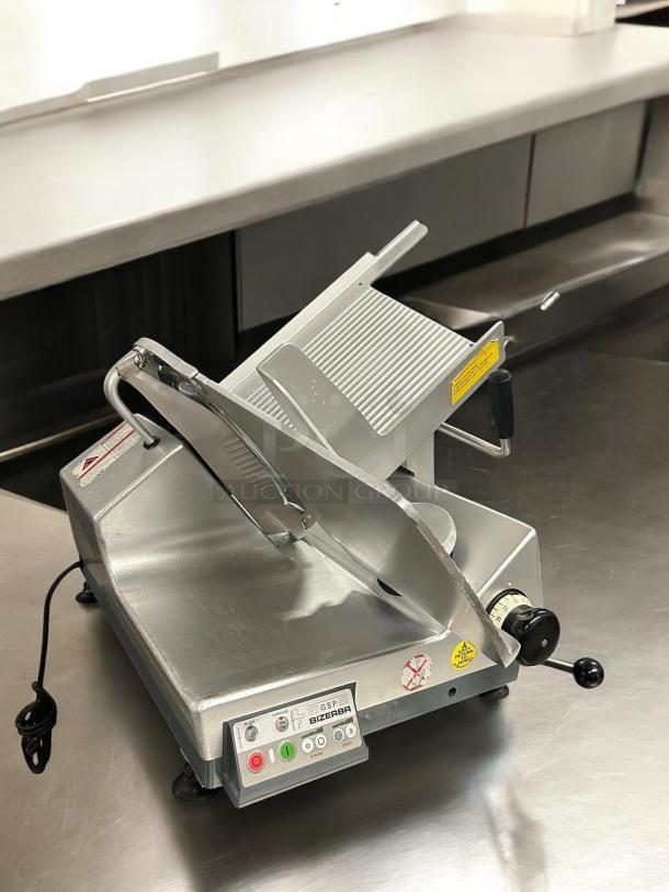 Immaculate Bizerba GSP HD Automatic Meat Slicer, 120V, fully tested. Includes control panel with functionality markings.