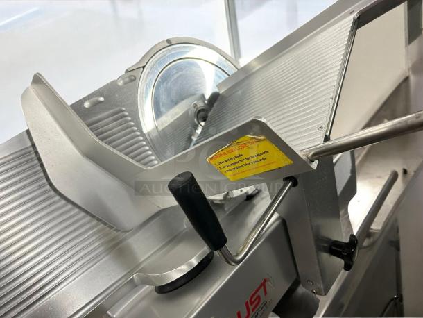 Immaculate Bizerba GSP HD Automatic Meat Slicer, 120V, fully tested, heavy-duty, reflective finish, with safety instructions visible.