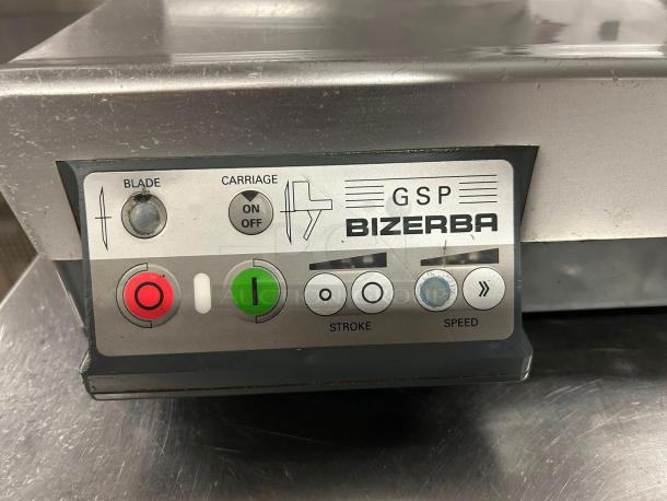 Bizerba GSP HD automatic meat slicer control panel showing power, stroke, and speed buttons; immaculate condition.