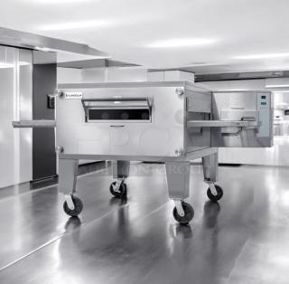 Outstanding condition XLT 3240 gas conveyor pizza oven by XLT Ovens, natural gas, fully tested and working, on casters.