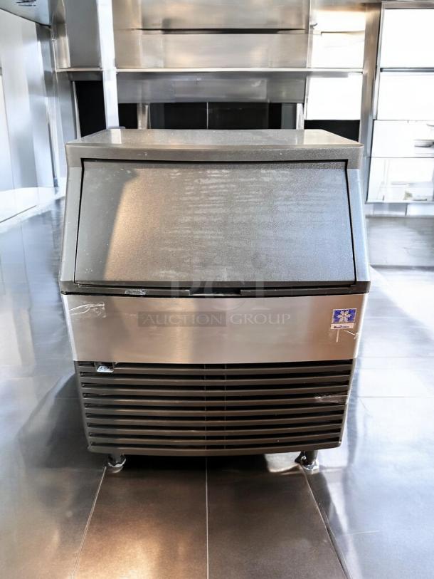 Manitowoc QD0272A undercounter ice maker in excellent condition, 115V, stainless steel, self-contained air-cooled with bin.