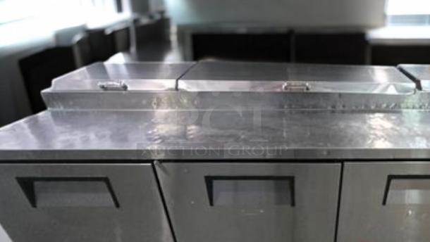 True TPP-93 3-Door Mega-Top Pizza Prep Table Refrigerator, excellent condition, 115V, stainless steel finish.