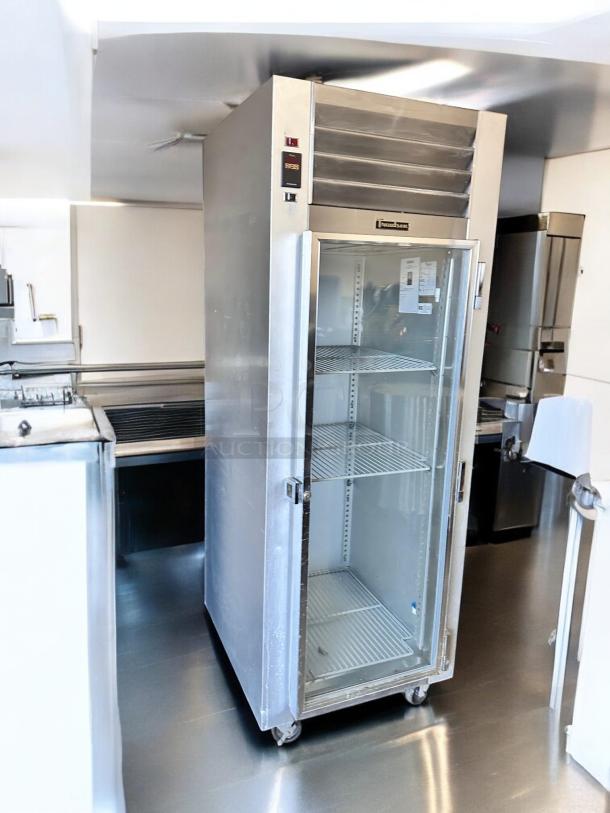 Traulsen G11010 single glass door refrigerator, excellent condition, stainless steel, visible brand logo, fully tested, 115V.