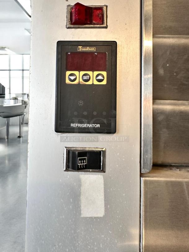 Traulsen G11010 refrigerator controls, displaying Traulsen branding and settings panel in excellent condition.