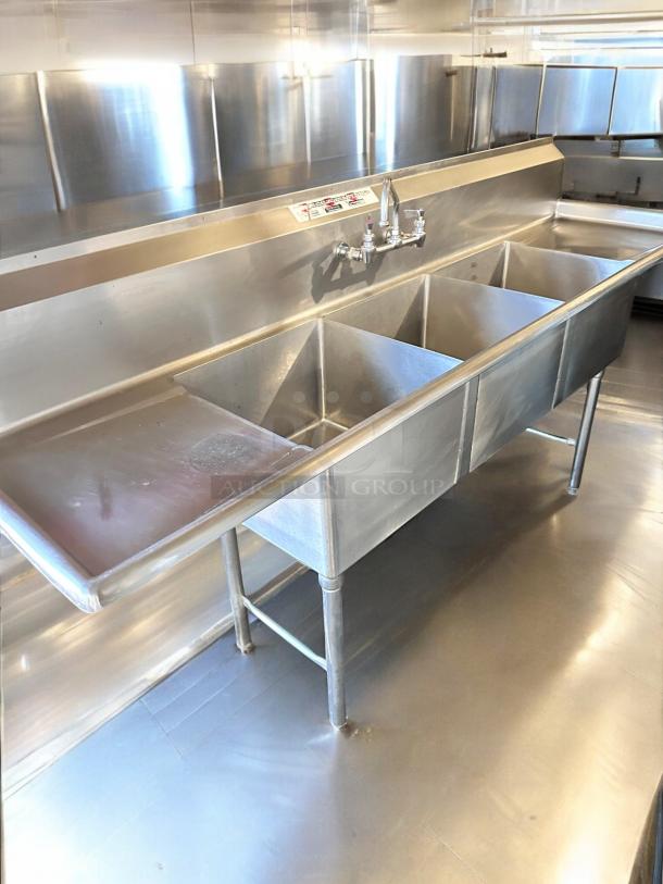 Allstrong S3B181 stainless steel 3-compartment sink with dual drainboards, NSF certified, excellent condition.