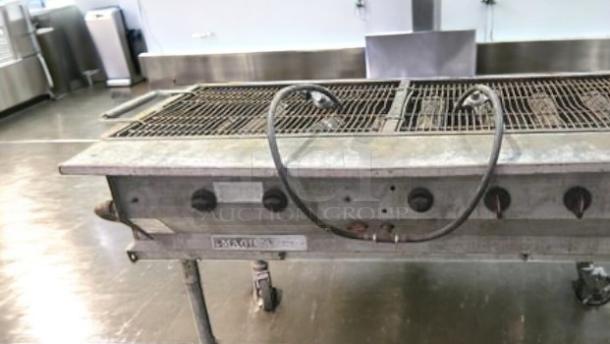 MagiCater LPG-60 portable gas charbroiler, excellent condition, 120,000 BTU, propane, fully tested, visible control knobs.