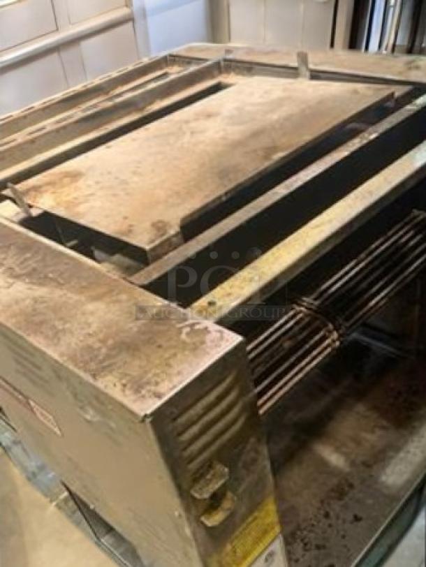 Nieco Automatic Broiler Model JF63, natural gas, 115V, fully tested and working, in outstanding condition, visible wear.