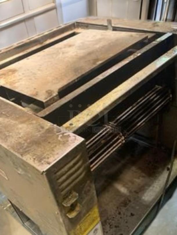 Nieco JF63 Automatic Broiler in outstanding condition. Natural gas, 115V, fully tested. Visible controls and grill components.