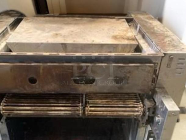 Nieco Automatic Broiler JF63, natural gas, 115V, outstanding condition. Fully tested and working, visible metal exterior.