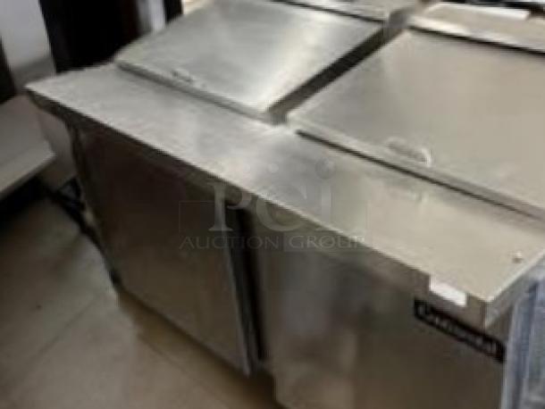 Continental Refrigeration dual-lid sandwich/salad prep table in superb condition. Fully tested, 115V, stainless steel.