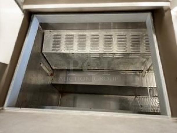 Continental Refrigerator dual-lid sandwich/salad prep table, interior view. Excellent condition, 115V, fully tested.