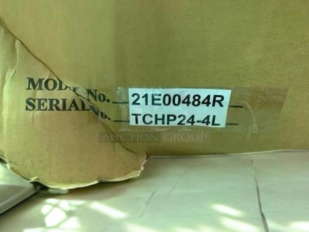 Cardboard packaging showing model number and serial number for ThermaTek TCHP24-4L 24" 4-burner gas hotplate.