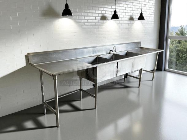 Commercial stainless steel 3-compartment sink with dual drainboards, USA design, in great condition, fully tested and working.