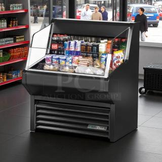 True THAC-36 air curtain merchandiser, pristine condition, 36-inch display, fully tested, stocked with assorted beverages and snacks.