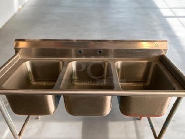 Advance Tabco T9-3-54 stainless steel, three-compartment sink in superb condition. NSF Certified, fully tested, ready to use.