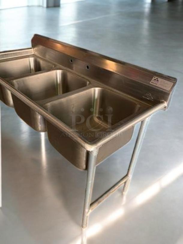 Advance Tabco T9-3-54 three-compartment stainless steel sink in superb condition, NSF certified. Fully tested and working.