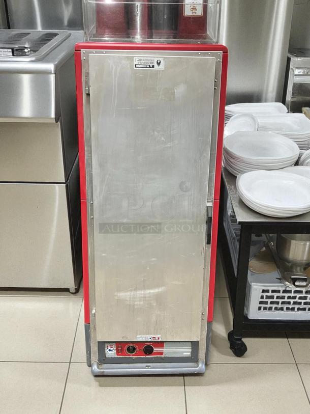 Metro C539-HFS-4 full-height insulated heated cabinet, 18-pan capacity, red trim, tested and working, pre-owned condition.