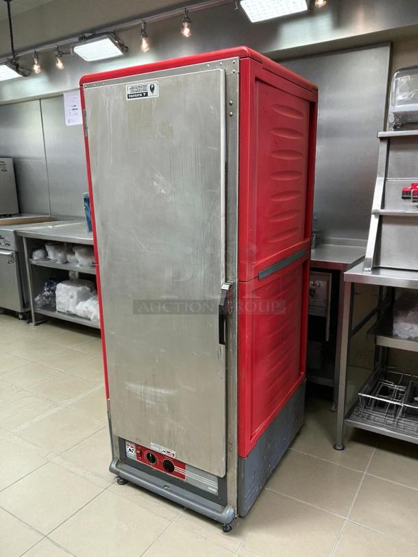 Metro C539-HFS-4 full height insulated mobile heated cabinet, 18-pan capacity, tested, working condition, red and silver design.