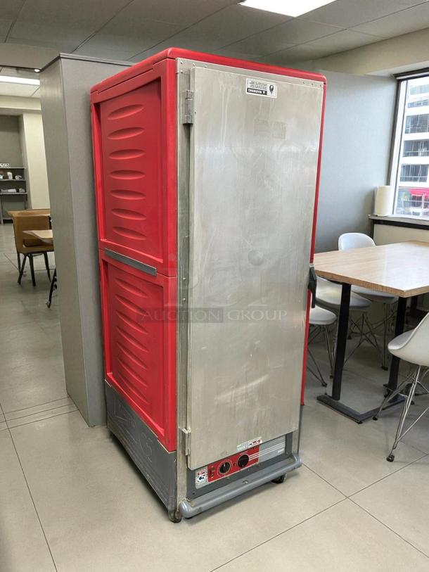 Metro C539-HFS-4 full height mobile heated cabinet, 18 pan capacity, red and stainless steel, tested and working condition.