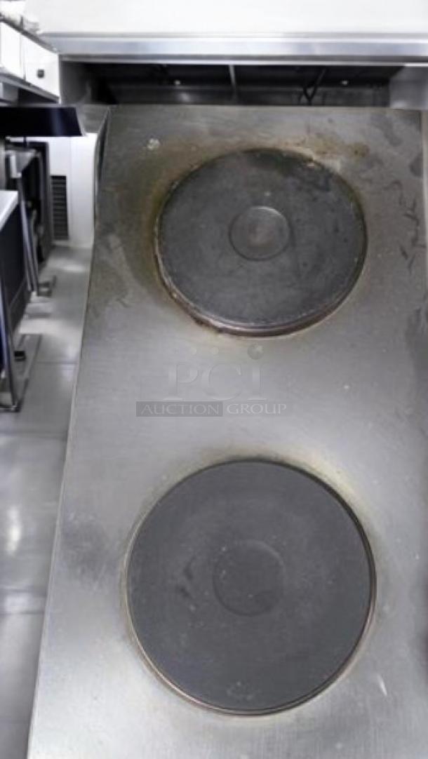 Nemco 6310-2 double solid burner hot plate, excellent condition, fully tested, 208V/240V, durable stainless steel.