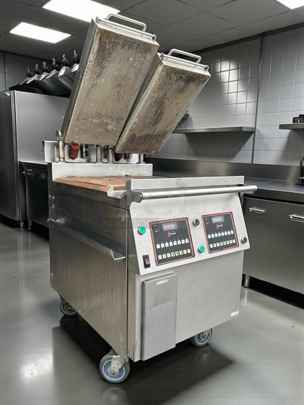 Garland Xpress XPG24 24" electric clamshell griddle, 200-240V, 3-phase, tested and working, stainless steel, on wheels.